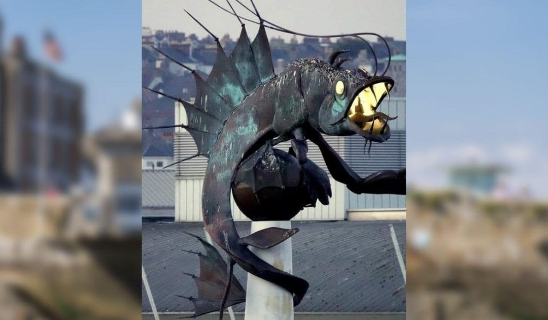 The Barbican Prawn lights up in Plymouth’s historic Sutton Harbour after eight years.
