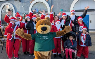 Over 800 Santas dash through the Barbican sun for the annual Santa Fun Run